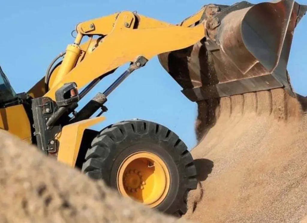 Loader at earth-moving site.